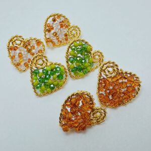 Aretes artesanales en bronce en forma de corazon
