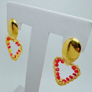 Aretes artesanales en bronce con diseño de corazon