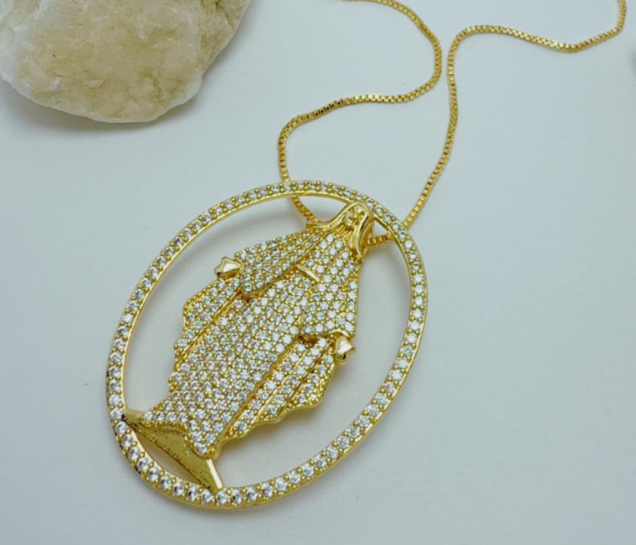 collar religioso en rodio dorada